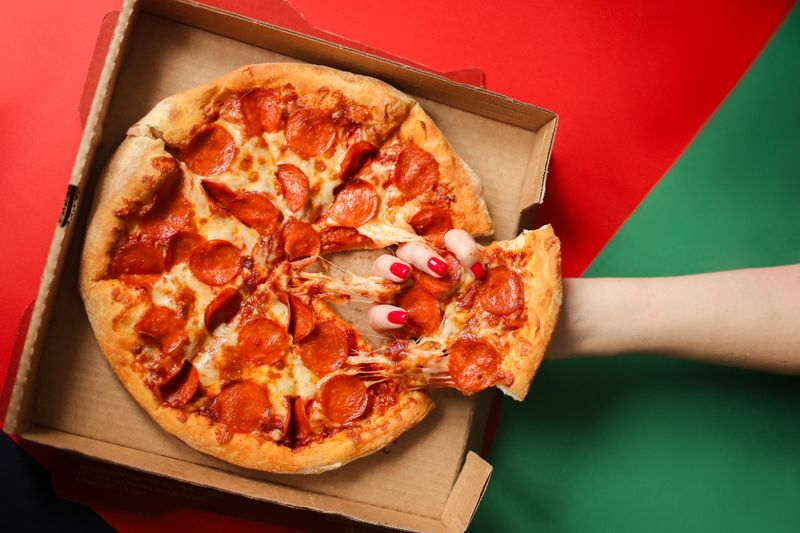 Wood-fired artisan pizza at Dewey's pizza restaurant
